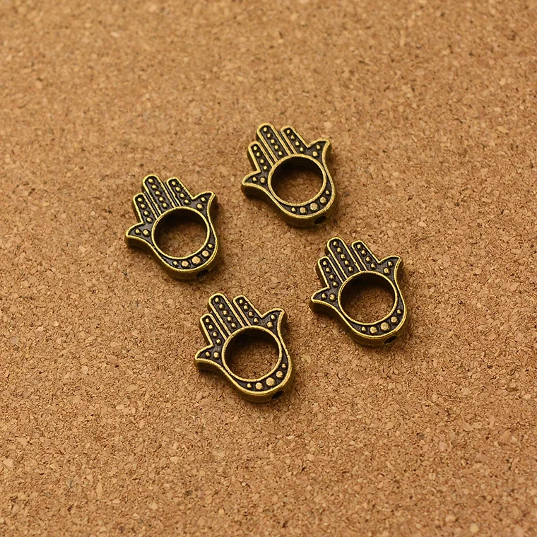 

Wholesale vintage 110pcs antique bronze Hamsa Symbol hand fatima hand Bead Frames charm diy jewelry Findings 1.5mm hola dia