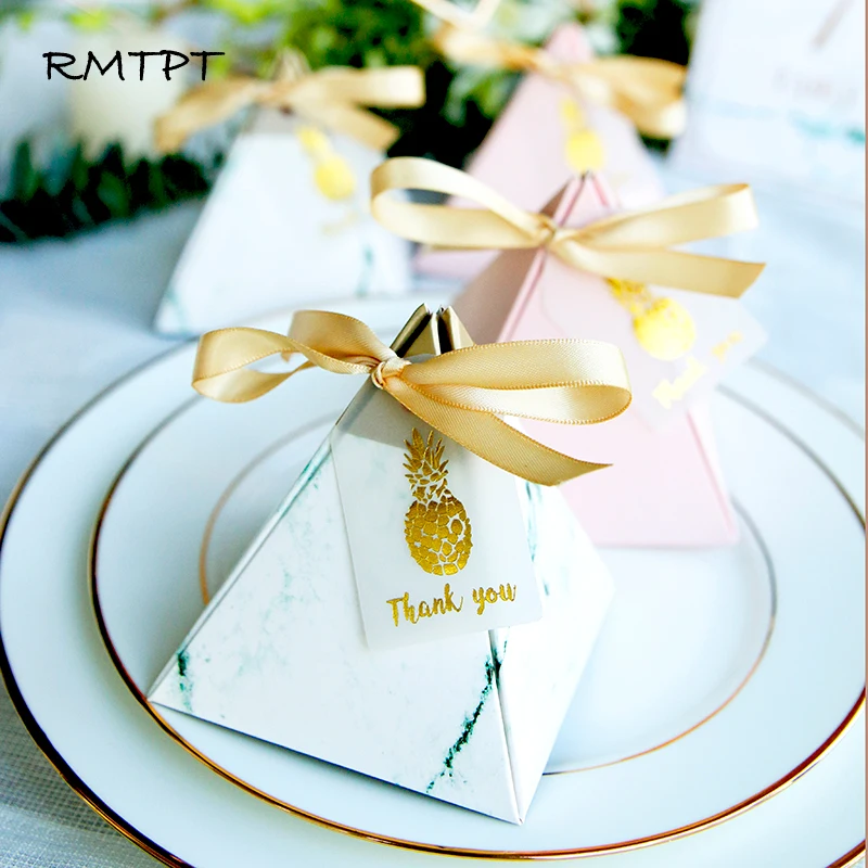 

New RMTPT 50pcs/lot Europe High-quality Triangular Pyramid Style Candy Box Wedding Favors Party Supplies Paper Gift Boxes with