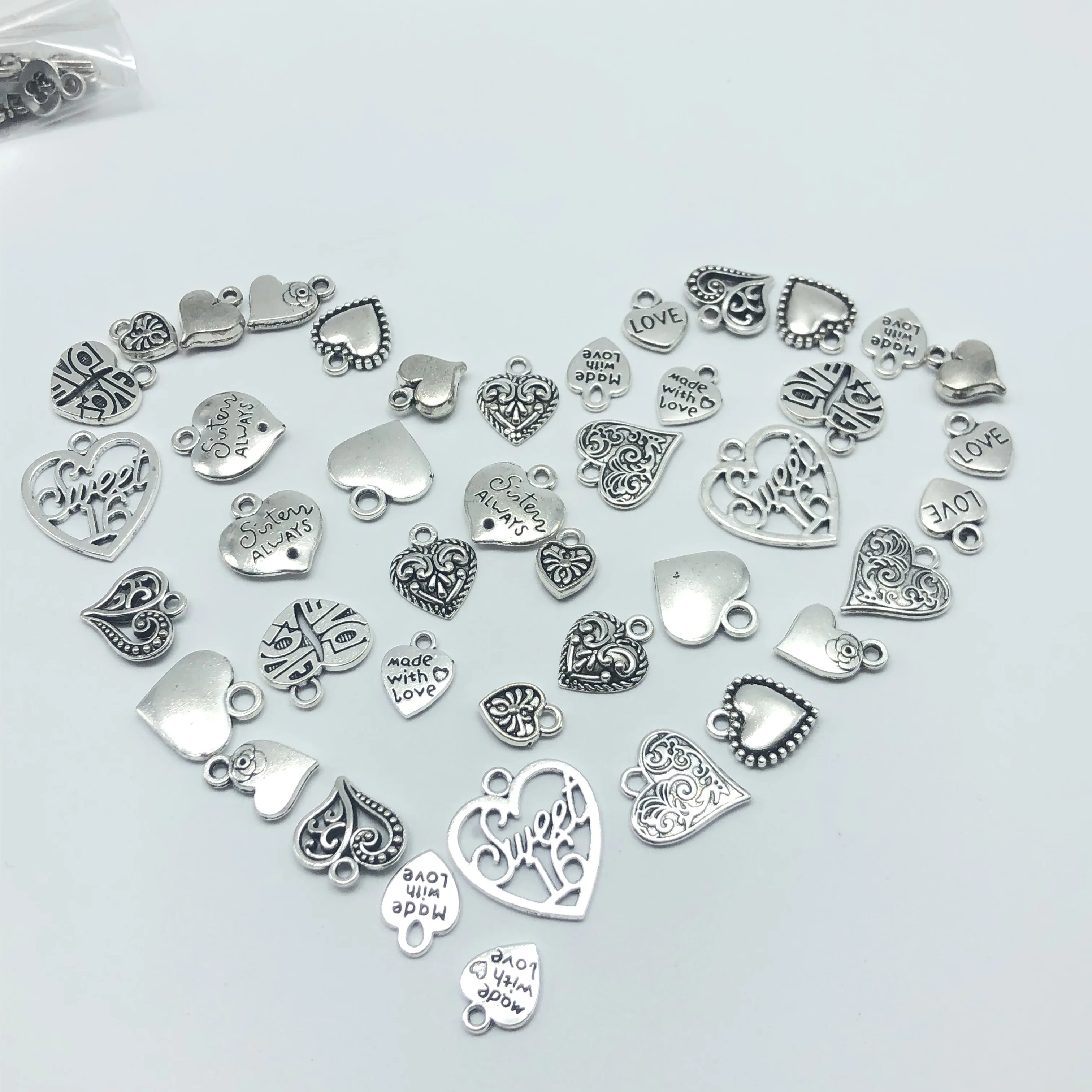 JunKang 30pcs Mixed batch Alloy Tibetan silver heart jewelry charm pendant classic DIY fashion findings