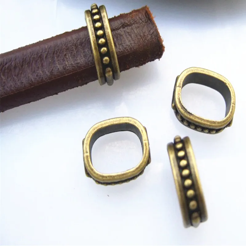 10pcs Antique Bronze 10x6mm Dots Striped Charms Beads Slider Spacers For Licorice Leather Cord