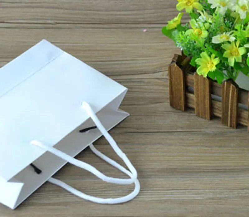 Stock multifunction paper bag with handle fashionable gift paper shopping bags clothing bags 19*13*6cm 30pcs lots