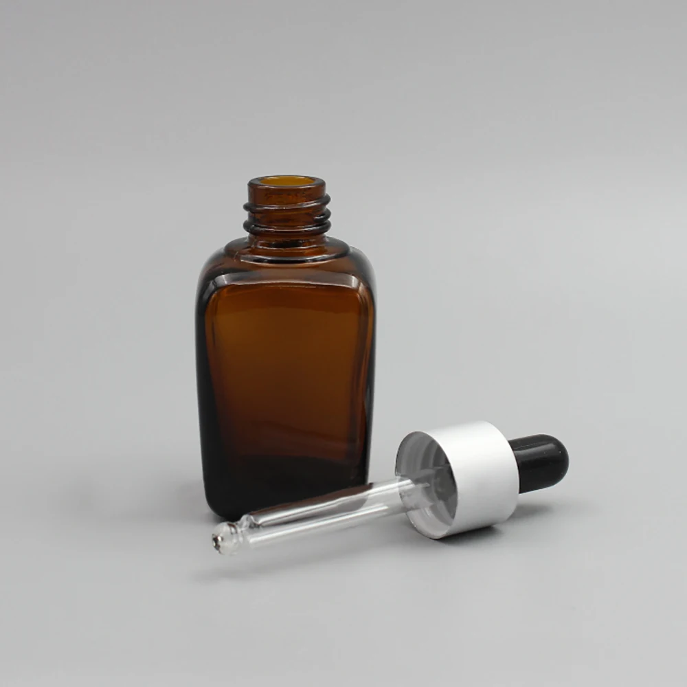 

100pcs 1 oz Square Glass Dropper Bottle With Eye Pipette 30ml Empty Amber Aromatherapy Essential Oils Bottle Containers