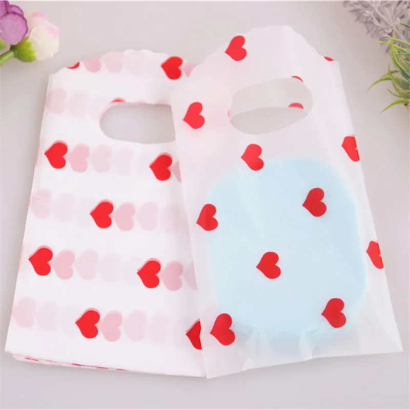 New Design Wholesale 50pcs/lot 9*15cm Mini Wedding Candy Pouches with Small Red Heart for lipstick Packaging