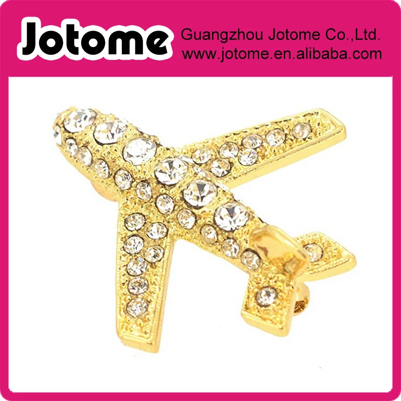 

Golden Airplane Brooch