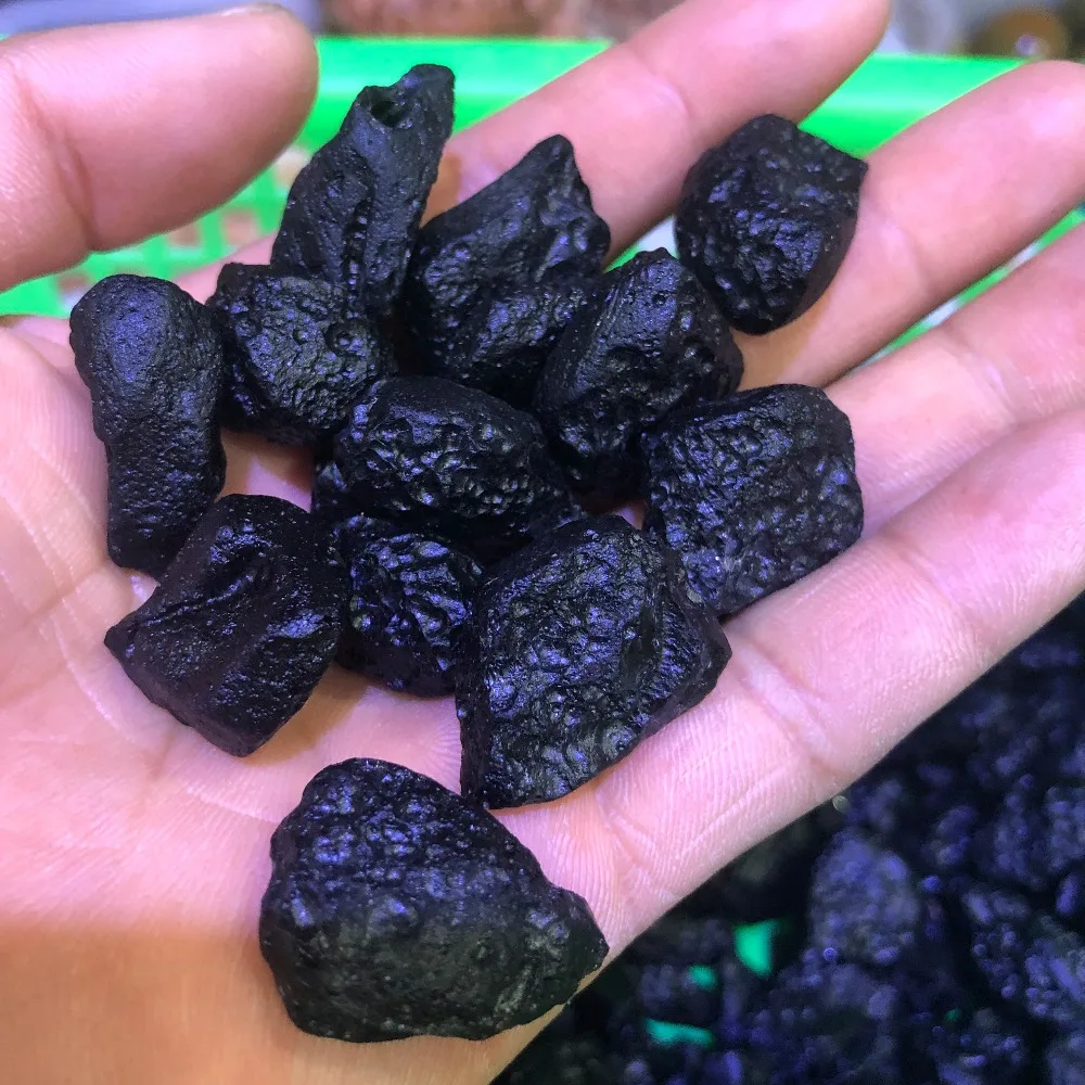 100gA natural specimen of black indosinian magnetite tektite