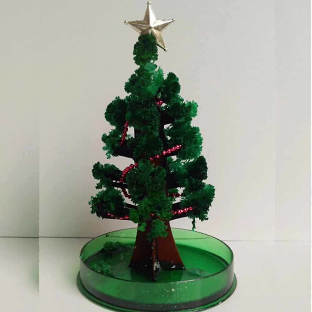 

Hot 2019 17cm H DIY Green Magical Grow Funny Christmas Trees Magic Growing Paper Crystal Tree Educational Kids Toys For Children