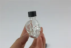 10pcs/lot Mini 8ml Essential Oil Bottles SkullShape Perfume Bottle Clear Glass Bottle with Orifice Reducer Cap Small Essential