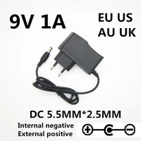 1 Uds AC 100-240V DC 9V 1A 1000ma guitarra eléctrica Stompbox adaptador de fuente de alimentación cargador para piezas de guitarra tablero de Pedal de efecto