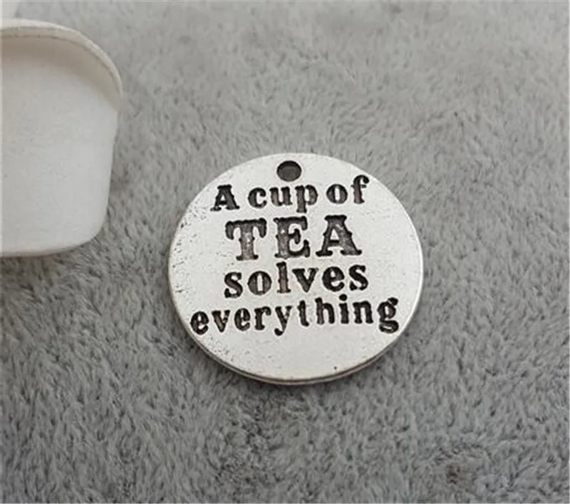 10 Pieces/Lot 25mm words a cup of tea solves everthing round disc charm tea charms pendant