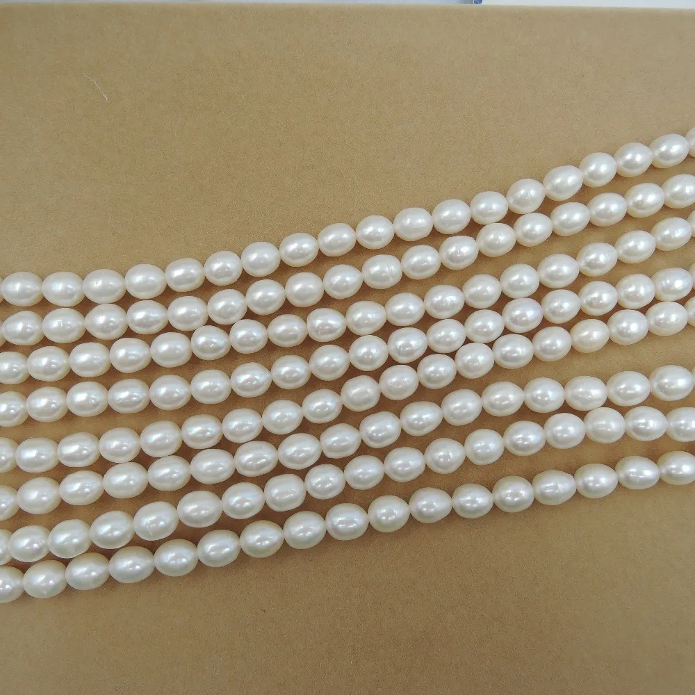 high quality pearl beads ,7-11 mm 100% freshwater pearl material with oval or rice shape-per strand