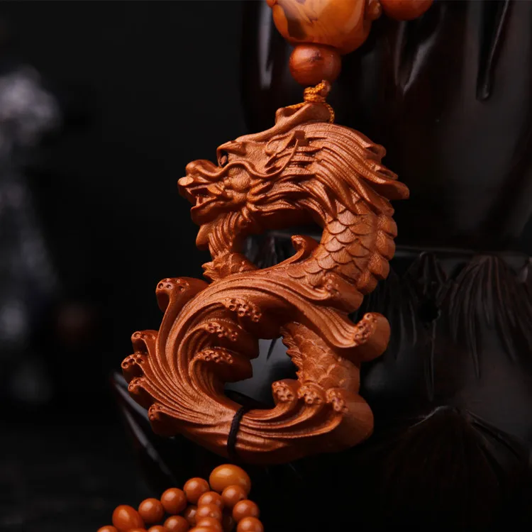 Factory direct sales peach pendant dragon and video fortune security key chain ornaments boutique car pendant