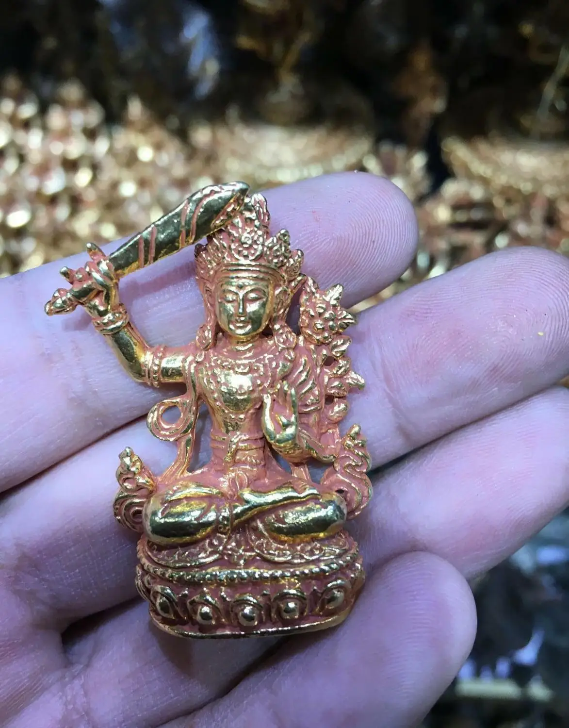 

Nepal tibet bronze gold carved small buddhism hold sword Manjusri Bodhisattva