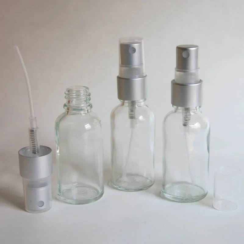 

wholesale 100pcs 30ml clear glass bottle with lotion sprayer, 30ml empty clear Essential Oil Spray Glass Bottle