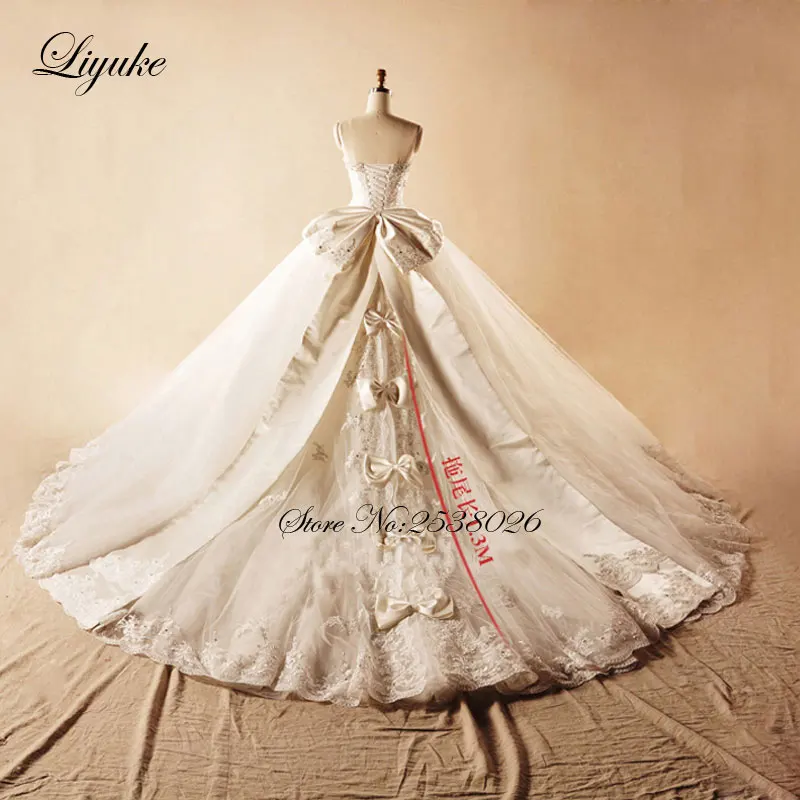 فستان زفاف Liyuke أنيق بدون حمالات مع فيونكة 2019 مزين بالخرز من الدانتيل فستان زفاف الأميرة رداء de mariage