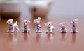 6 piezas de mini perros con manchas