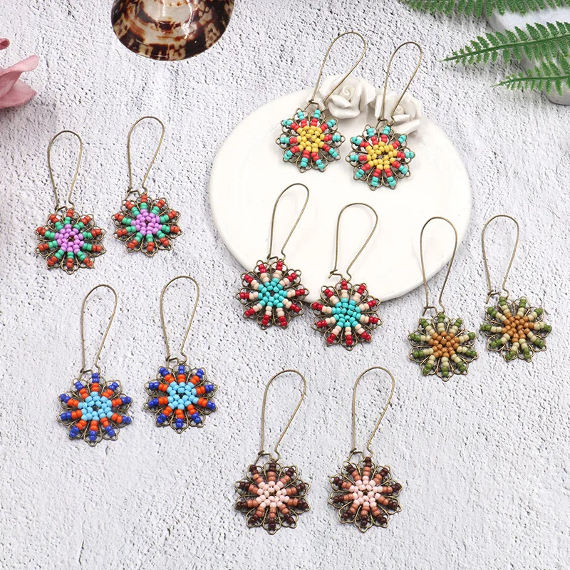 Pendientes con flecos de perlas de arroz de estilo europeo y americano, joyería hecha a mano de girasol para mujer, personalidad de moda