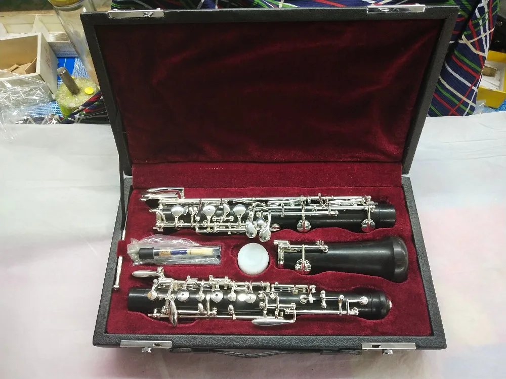 High-grade oboe Ebony body Nickel-plated keys Good sound Full automatic oboe C key