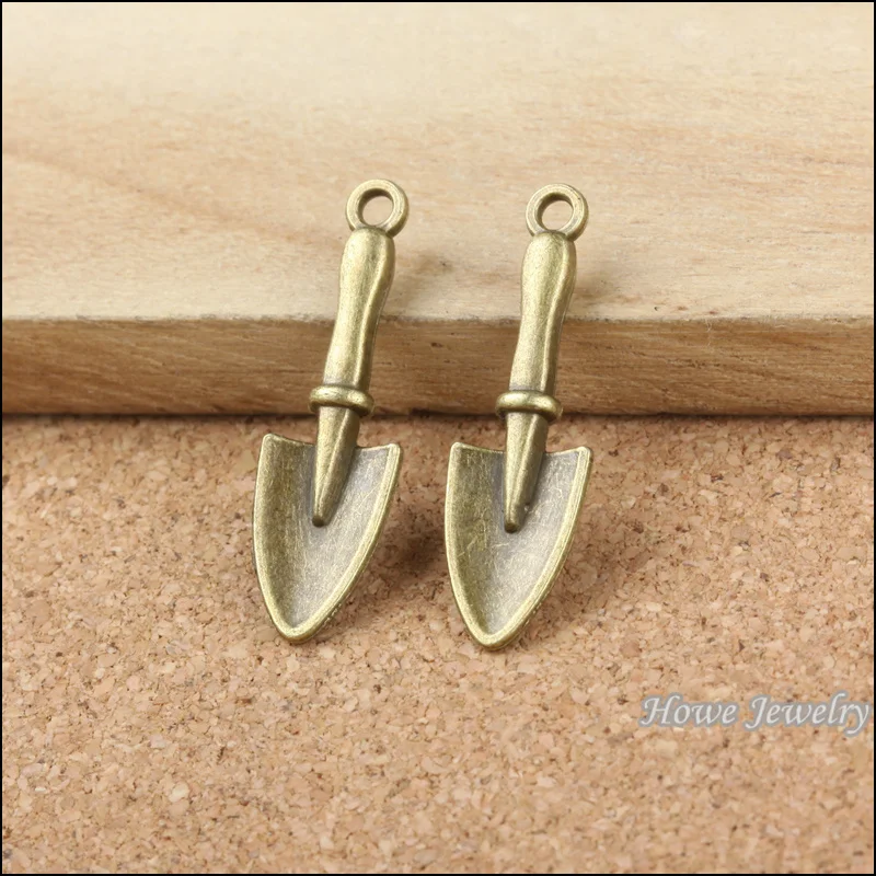 

Wholesale vintage 100pcs antique bronze Shovel pendant charm fit for European Necklace diy jewelry Findings 10097