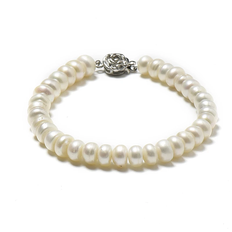 A flat ellipse  Same Sizes  with  Smooth  Light  Yellow  and Unique Design 5*7 mm  Freshwater  Natural pearl Bracelet