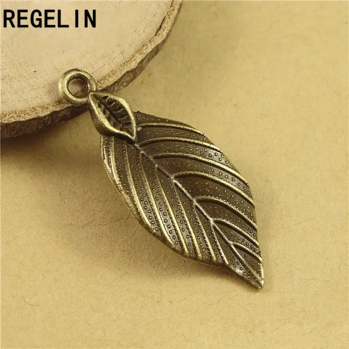 REGELIN Antique Bronze leaf Charm Pendant 10pcs 32x12mm for Diy Necklace Jewelry Making Handmade Craft  jewelry accessories