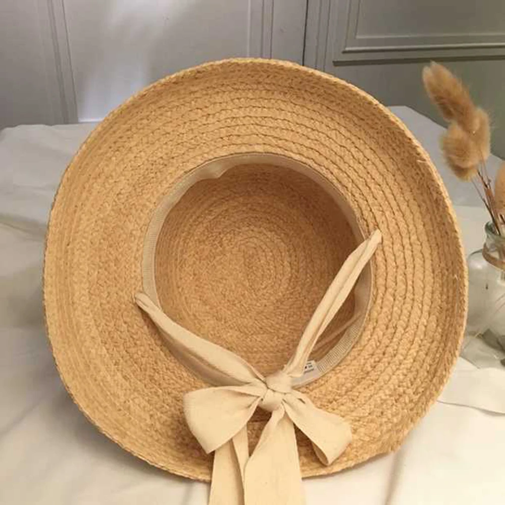 New fashion women\' Summer sun hat Handmade Raffia cap Visor Ribbon hat Wide side Travel vacation Beach hat Elegant lady seaside