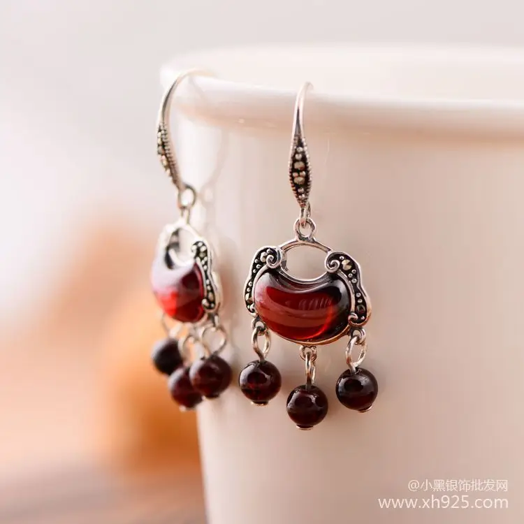 KJJEAXCMY fine jewelry S925 Pure silver jewelry  pomegranate stone lock style national style court tassel earrings