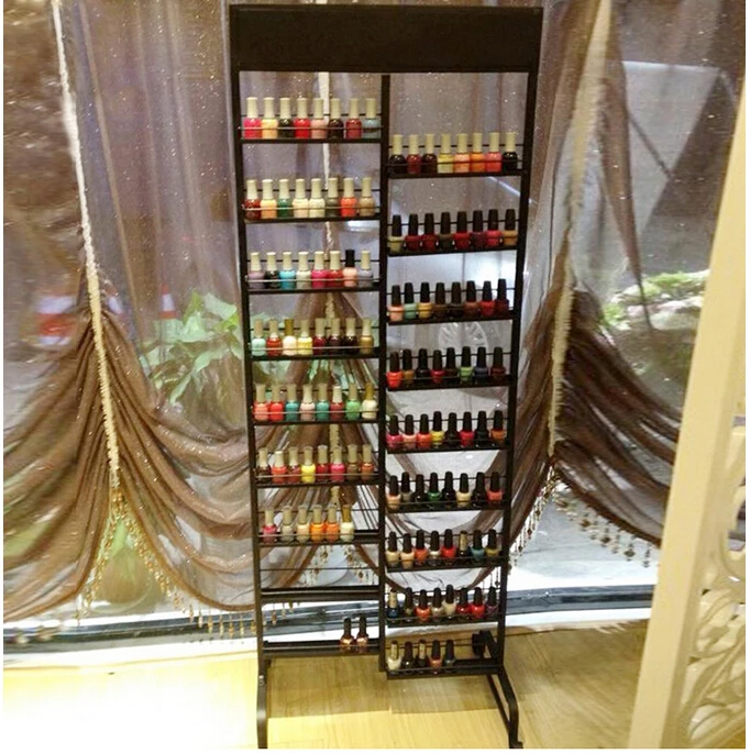 wrought iron nail polish rack.. Cabinet salon shelf. Show. Cosmetics.