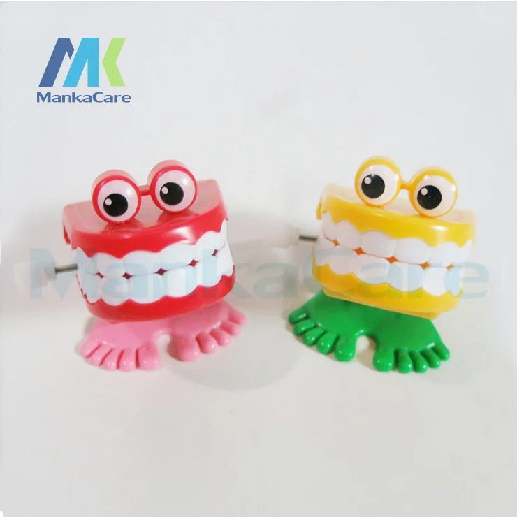 20 Pcs Children's toys on the chain / chain jumping tooth / strange new toy /cute playful children's plastic toys Dental gifts