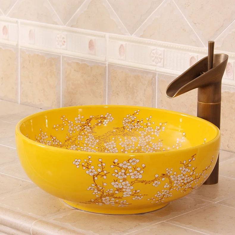 

China Artistic Handmade Yellow plum blossom Painting Ceramic wash basin Round Counter top wash sink ceramic hand painted