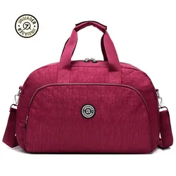 Bolso de viaje de nailon para mujer, bolsa de lona con ruedas, equipaje de moda, novedad