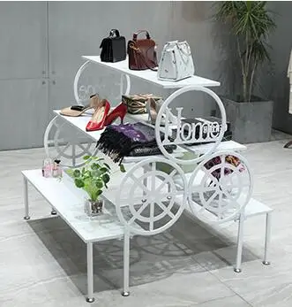 Clothing store high and low platform shopping mall display stand handbag and shoes rack running water table window nakashima .