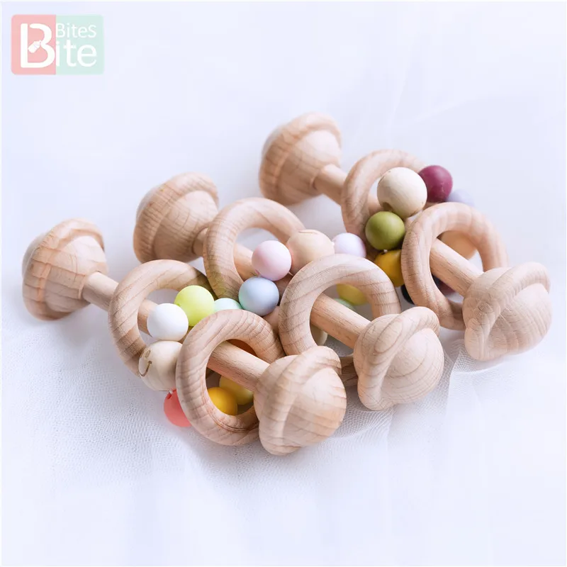 

Bite Bites 1pc Baby Rattles Toy Intelligence Grasping Gums Beech Wood Teething Hand Bell Rattle Funny Educational Mobiles Toys