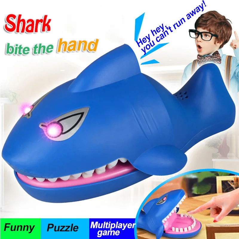 

Halloween prank shark electric large shark bite fingers audible toys bite fingers.