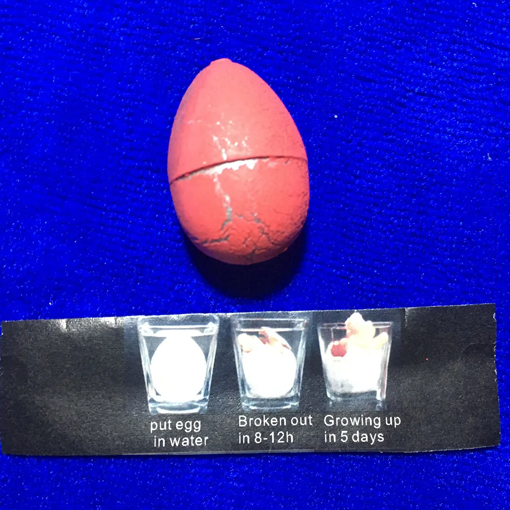 60 pcs/lot 32mm capsule en plastique jouet eau à couver oeuf de dinosaure rempli de boule en plastique jouets Surprise enfant jouets Surprise balle