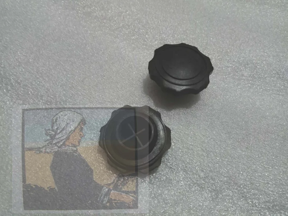 

set of oil filling cap for valve cover and timing case cover for Quanchai QC490T,QC495T, part number: N85-01002A + R175A-01211-1