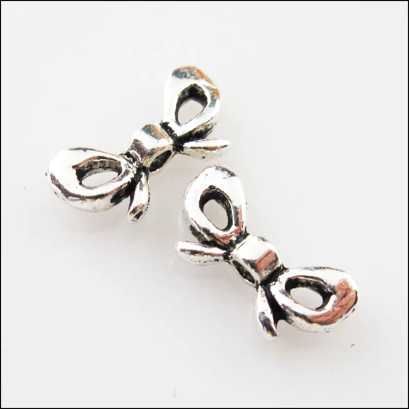 

60Pcs Tibetan Silver Color Butterfly Knot Spacer Beads Charms 6x12mm