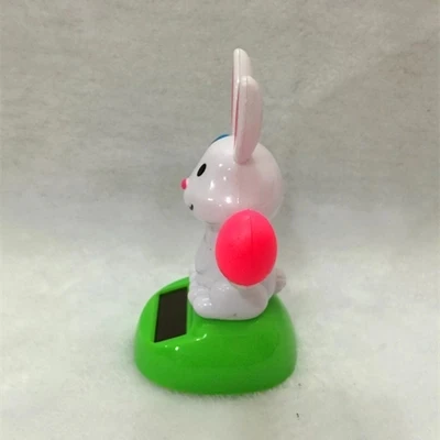 Solar Automatic Swing Sun Flower Radish Rabbit Interior Decoration Car Ornaments Unisex Plastic Electronic 2021