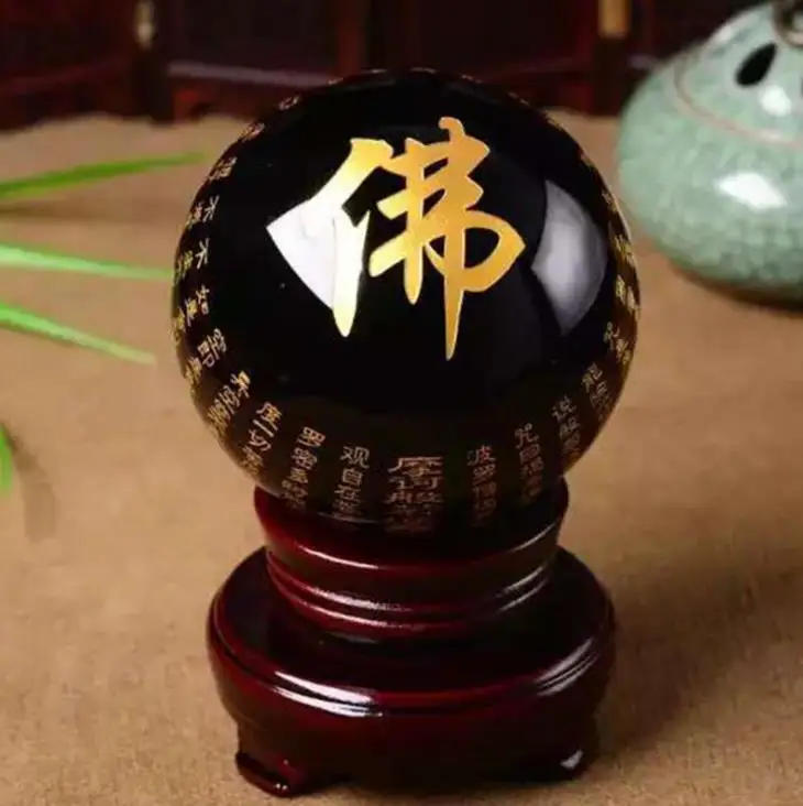 

Natural obsidian sphere of great sorrow mantra of the Buddha sphere six words of proverbs the buddhist sutra black crystal ball