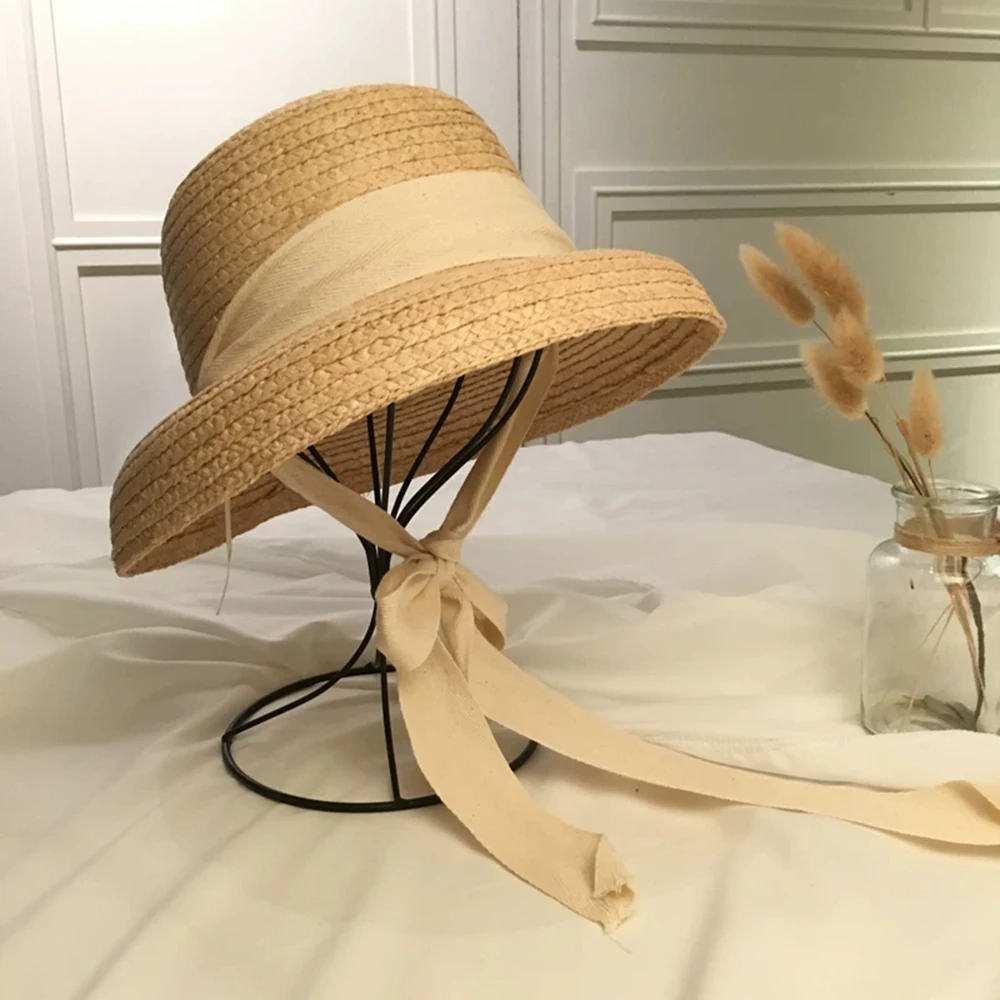 New fashion women\' Summer sun hat Handmade Raffia cap Visor Ribbon hat Wide side Travel vacation Beach hat Elegant lady seaside