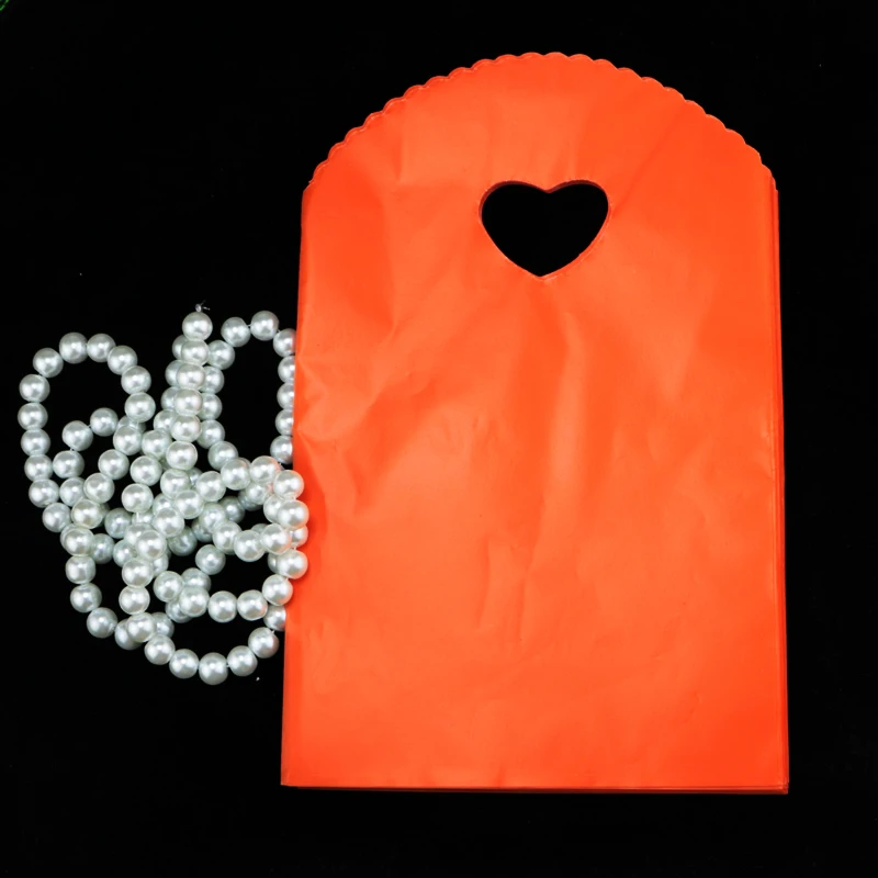 50pcs/lot Orange Plastic Bag 13x21cm Small Boutique Jewelry Bag With Handle Plastic Gift Bags And Packaging Pouches