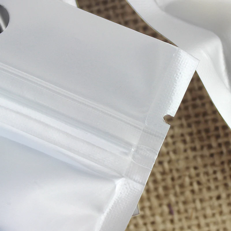 16*26cm 50Pcs/ Lot Plastic Zipper Lock White / Clear Pouches Self Seal Storage Retail Ziplock Packaging Bags With Hang Hole