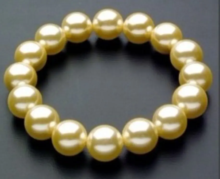 FREE shipping Wonderful South 10mm Yellow Sea Shell Pearl Bracelet AAA 7.5