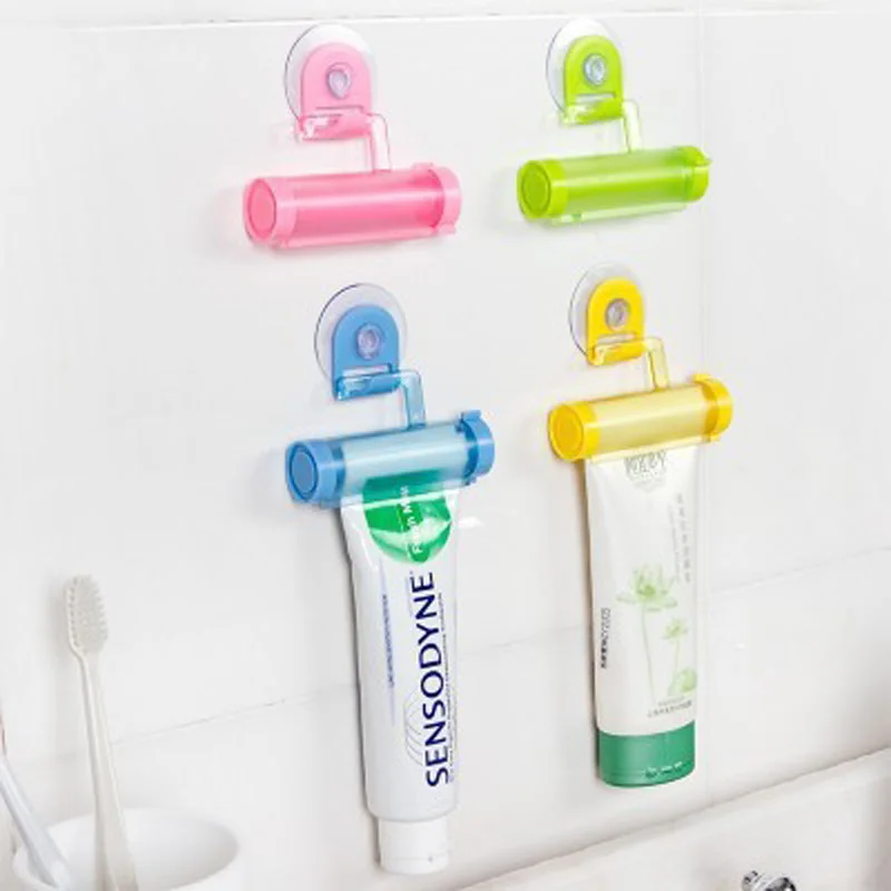 

200pcs/lot Brand New Colorful Plastic Tube Rolling Toothpaste Squeezer Dispenser Hook Holder Sucker Hanging Bathroom Wall