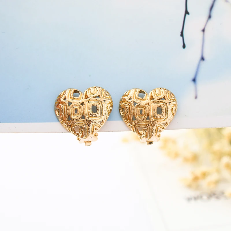 COWNINE Alloy Lovely hearts earrings Hot melting Lovely hollow out hearts earrings ear clip Popular peach heart pendant