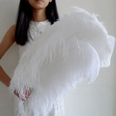 

YOYUE 100 Pcs/Lot Natural White Ostrich Feathers For Crafts 65-70CM Carnival Costumes Party Home Wedding Decorations Plumes