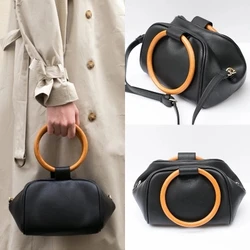 Borsa a tracolla di nuova moda anello rotondo borsa con manico in legno borsa a secchiello da donna famosa personalità di design piccole borse a tracolla