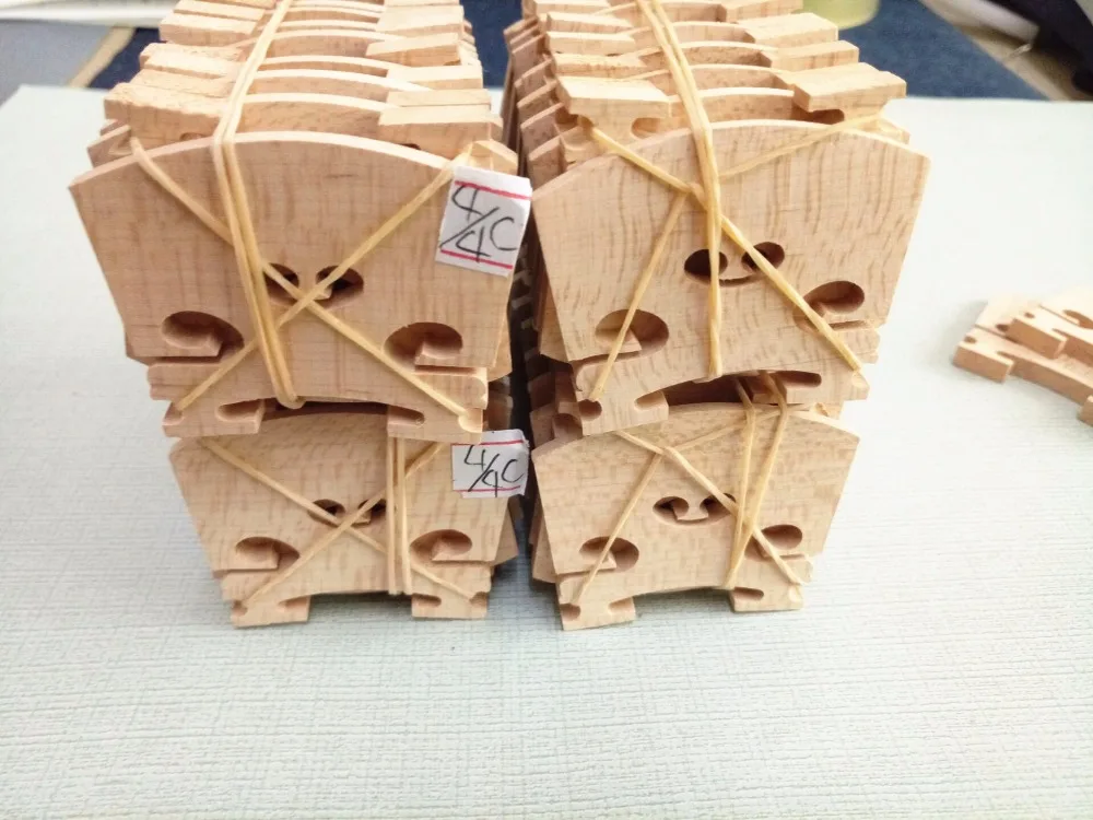 

50 pcs most solid maple wood 4/4 violin bridges dried in the open air 15 years