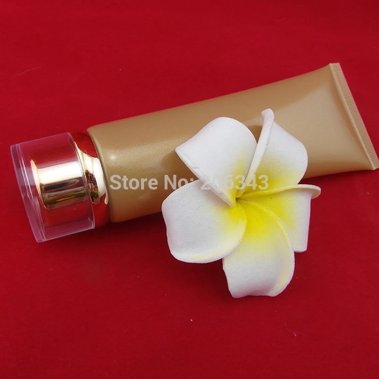 

100ml gold soft tube or mildy wash tube or butter or handcream tube with acrylid gold lid