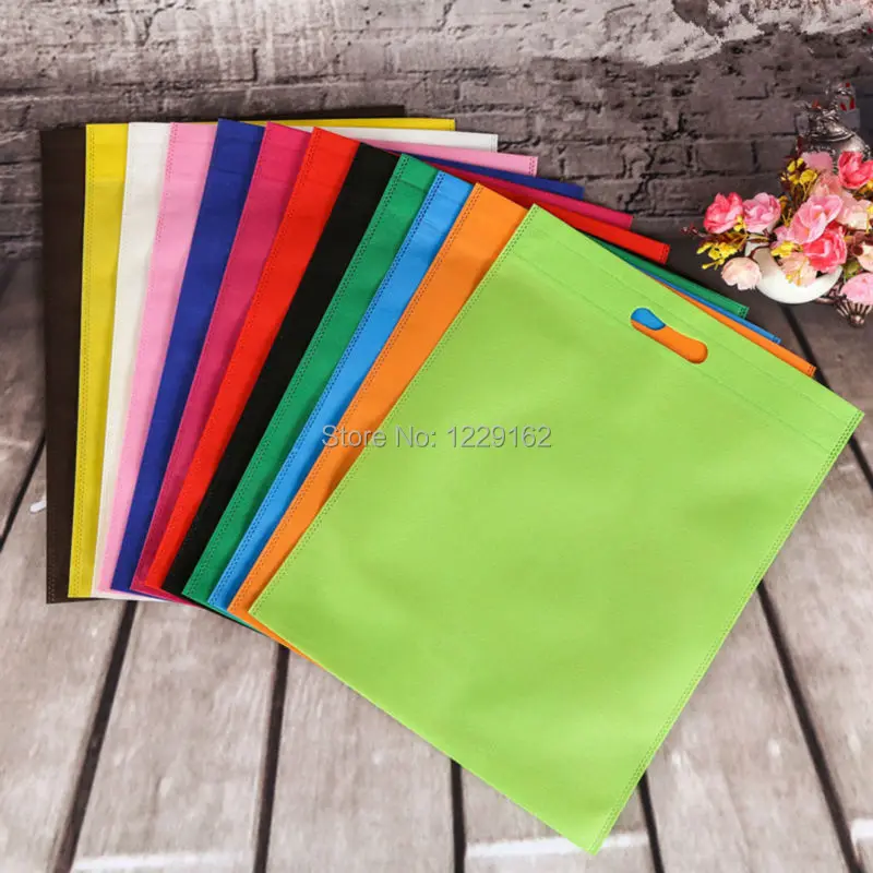 Free shipping 25x35cm Promotional Small Nonwoven Gift Bags Colorful Plain PP Non woven Shopping Bags Party Supplies