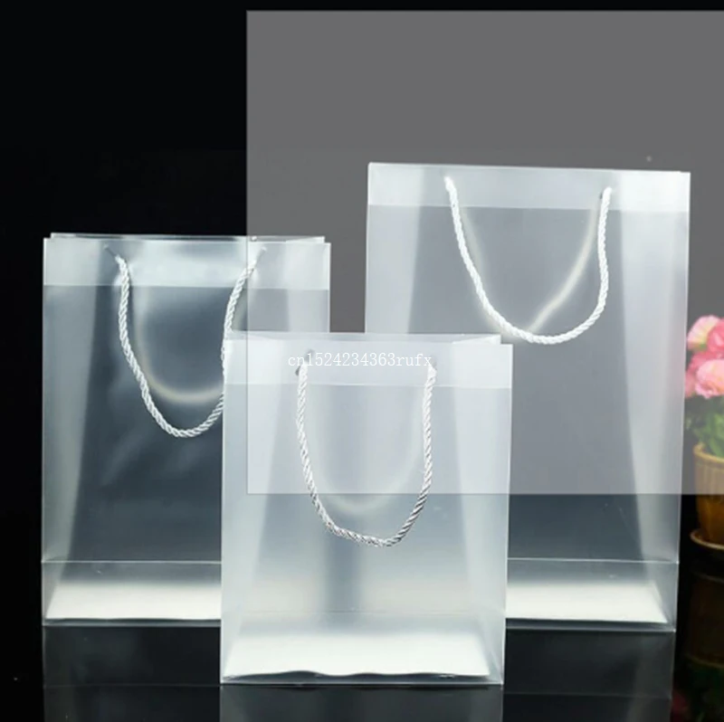 100pcs Plastic Handbag Frosted PP Plastic Gift Tote Packaging Bags With Handle Clear Translucence Gift Box Size 27*19*7cm